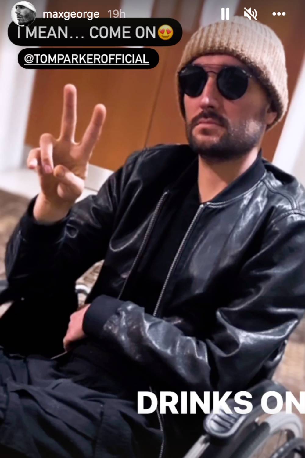 Tom Parker in a post from Max George that showed Tom in a wheelchair