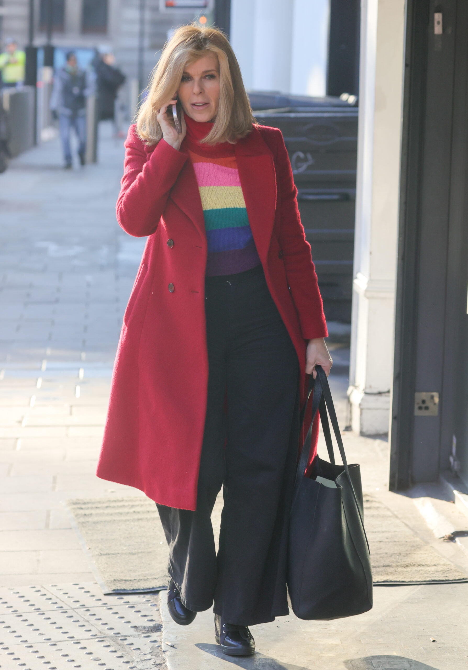 Kate Garraway wearing a red coat