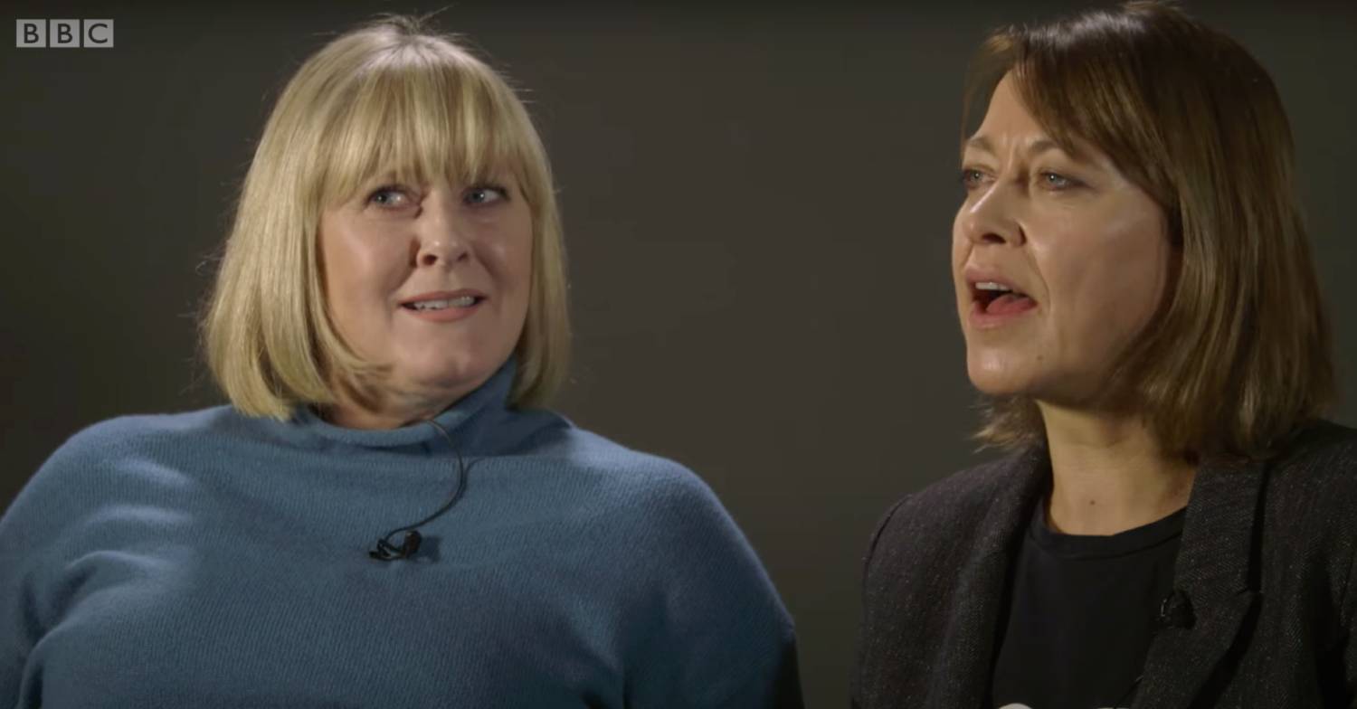 Sarah Lancashire and Nicola Walker chatting in front of a grey background