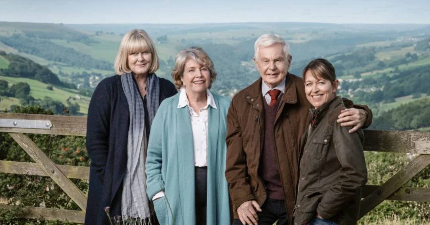 The cast of Last Tango in Halifax against a green backdrop