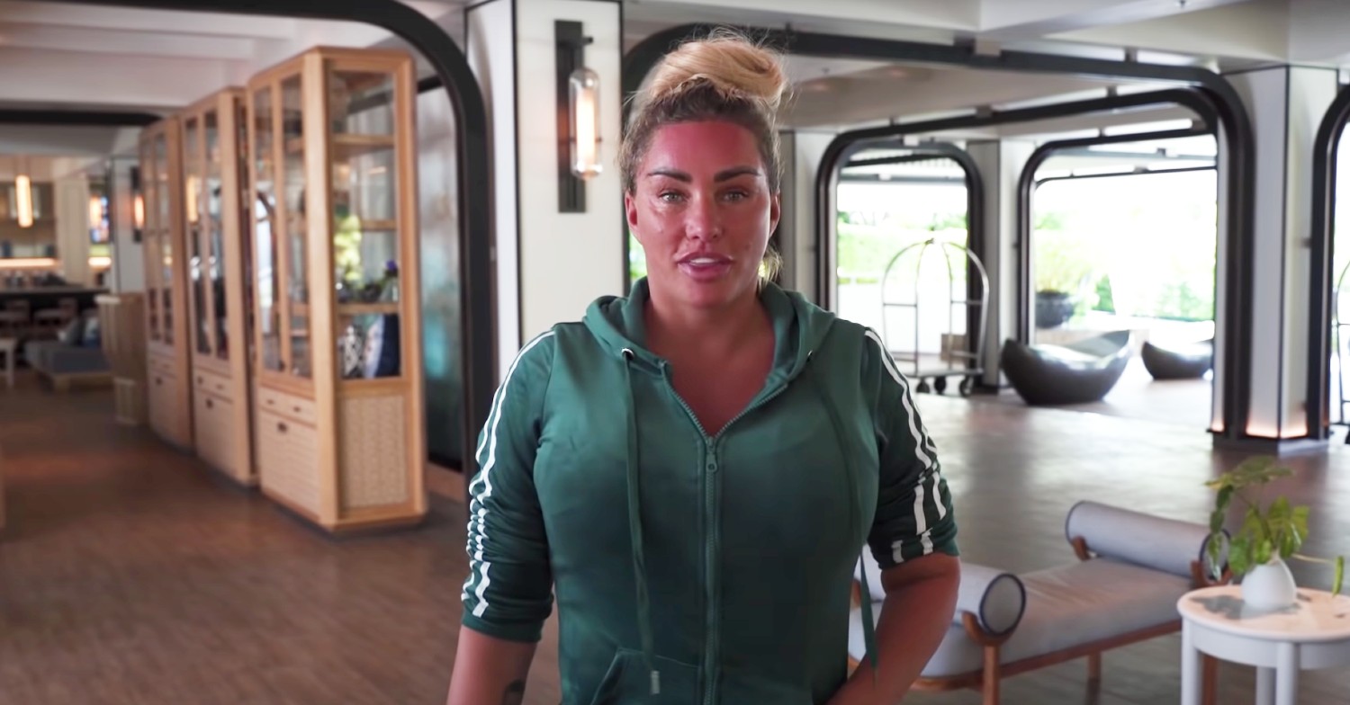 Katie Price in a green tracksuit talking to camera