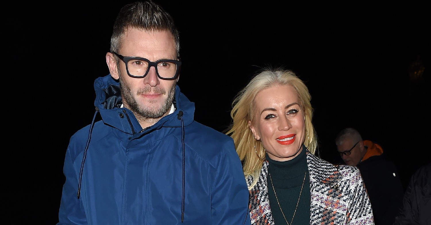 Eddie Boxshall and Denise Van Outen walking at night, smiling for cameras