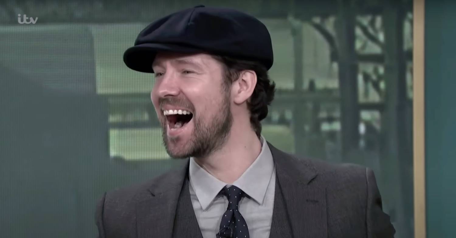 A model laughing on the show