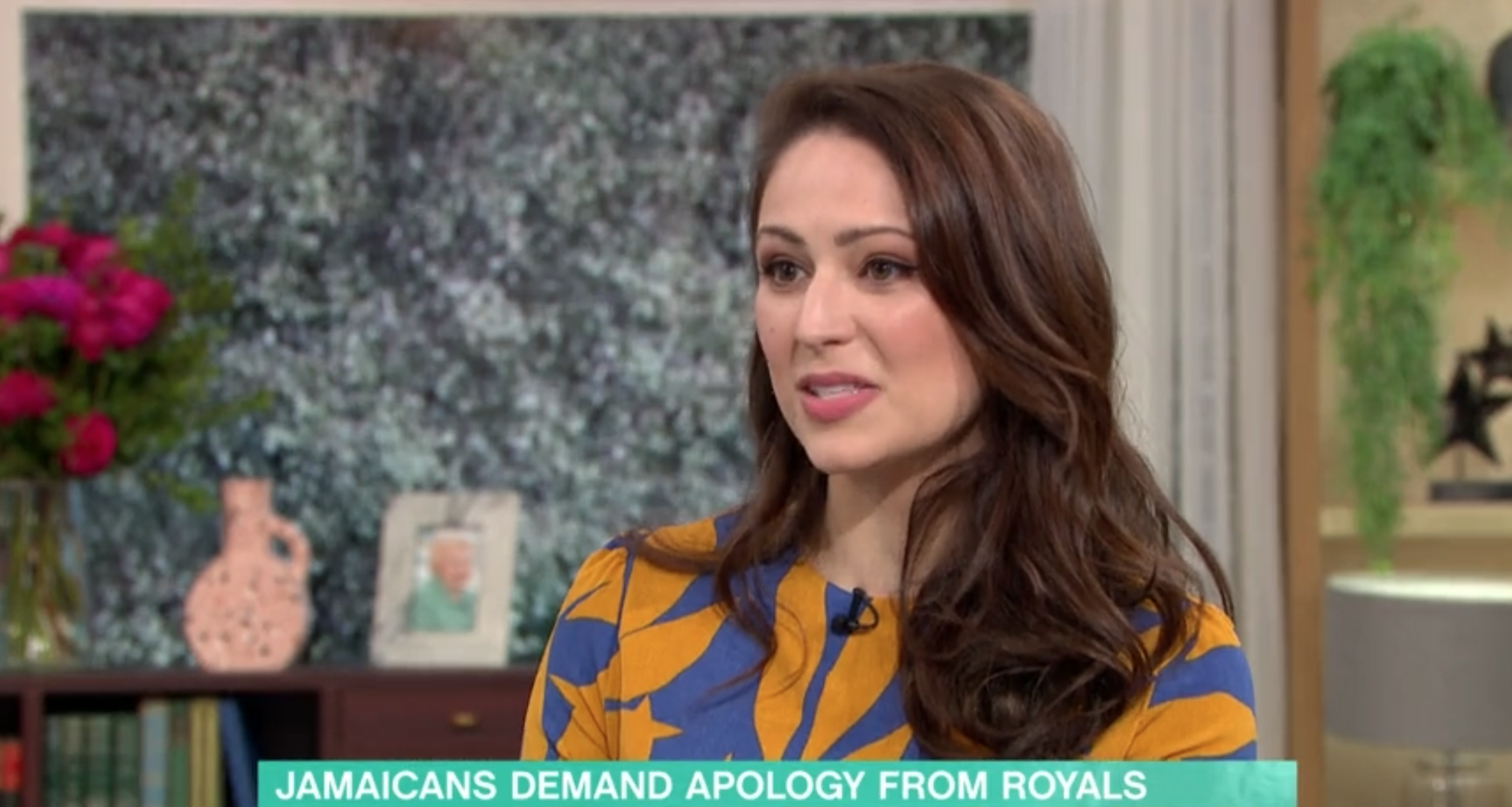 Nicola Thorp in a blue and yellow dress