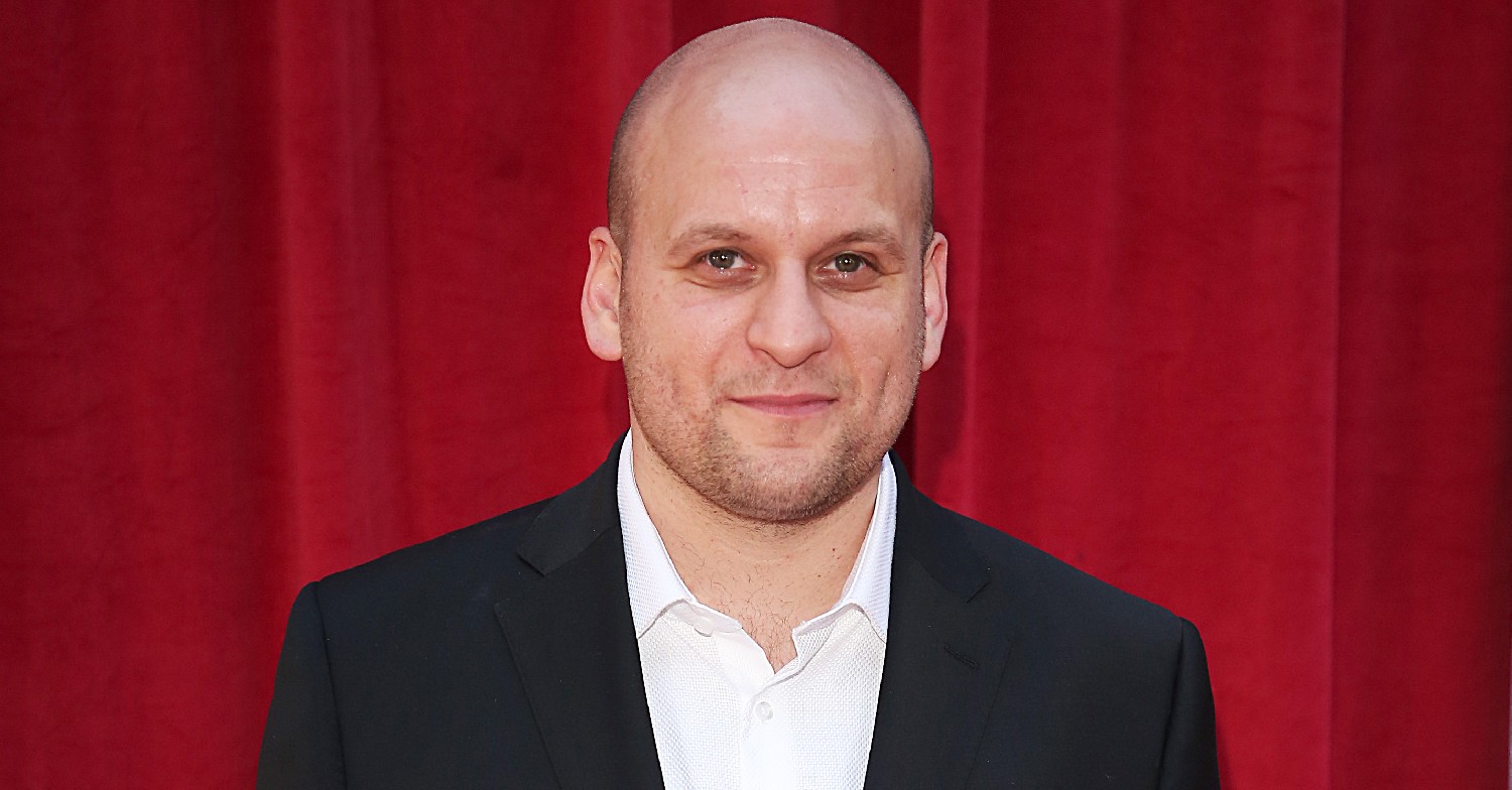 EastEnders star Ricky Champ smiling for camera