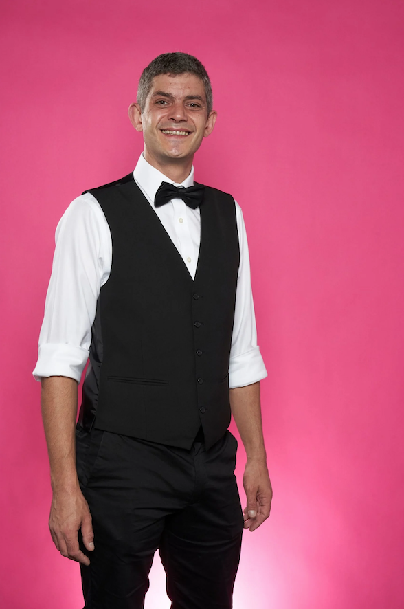 First Dates star merlin smiling in a bow tie