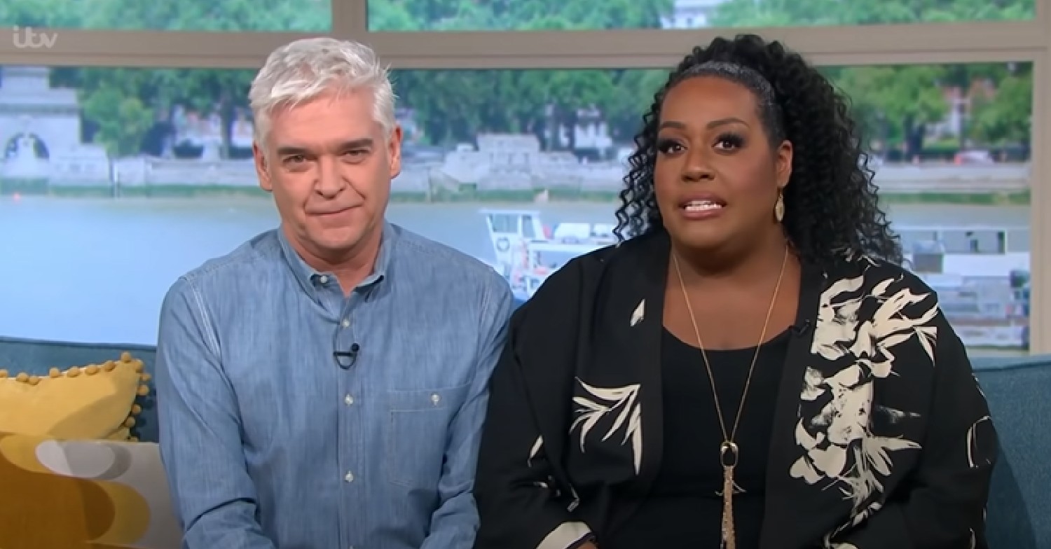 Phillip Schofield and Alison Hammond sit close to each other on This Morning
