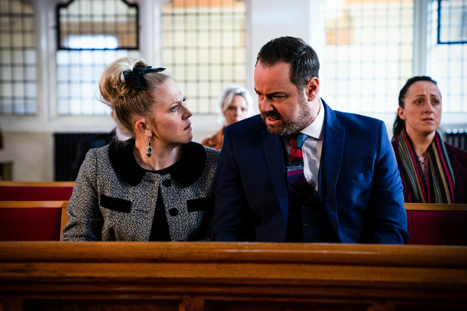 Linda and Mick in heated discussion at Tina's funeral in EastEnders