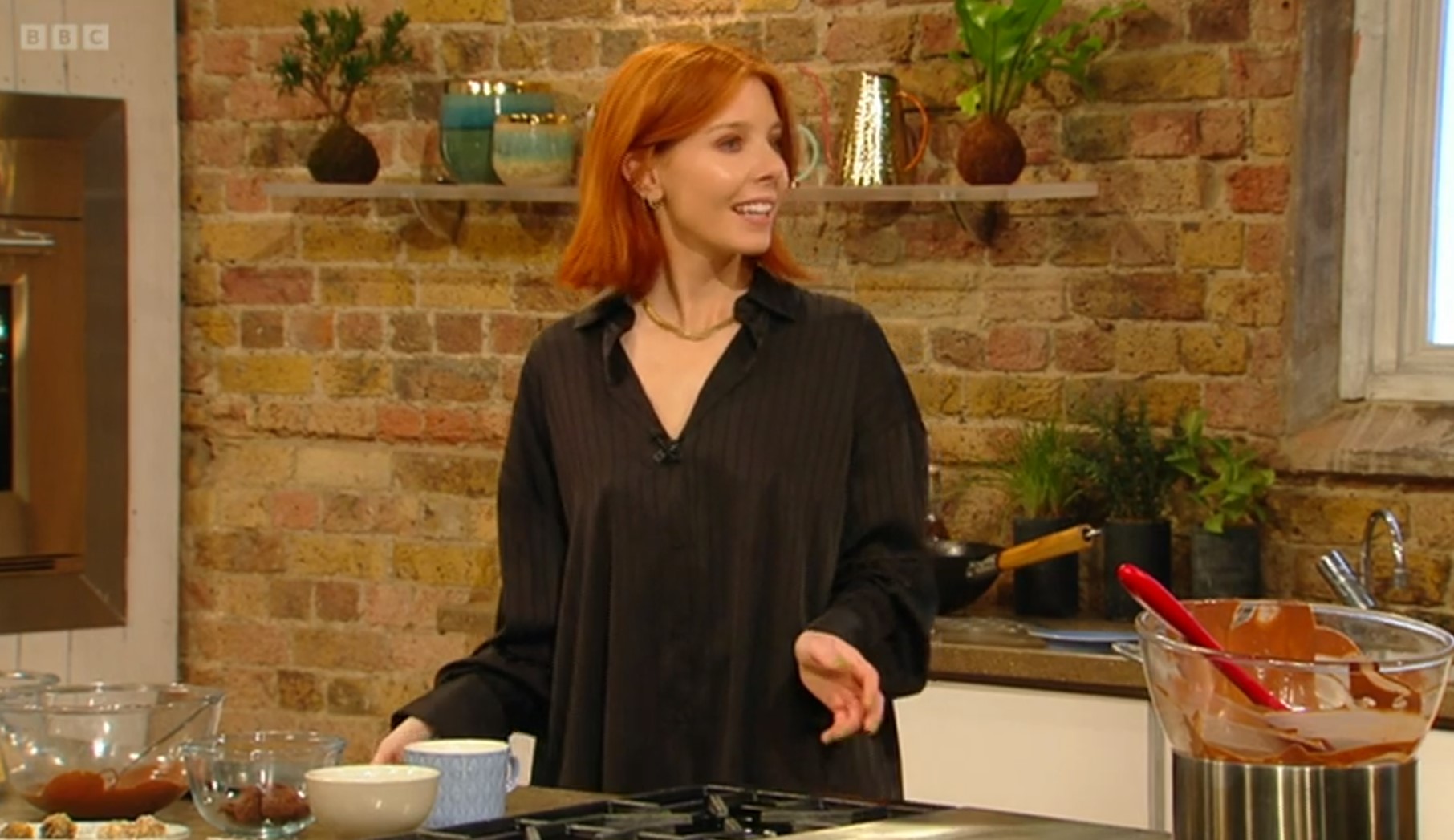 Stacey's blouse was fully done up