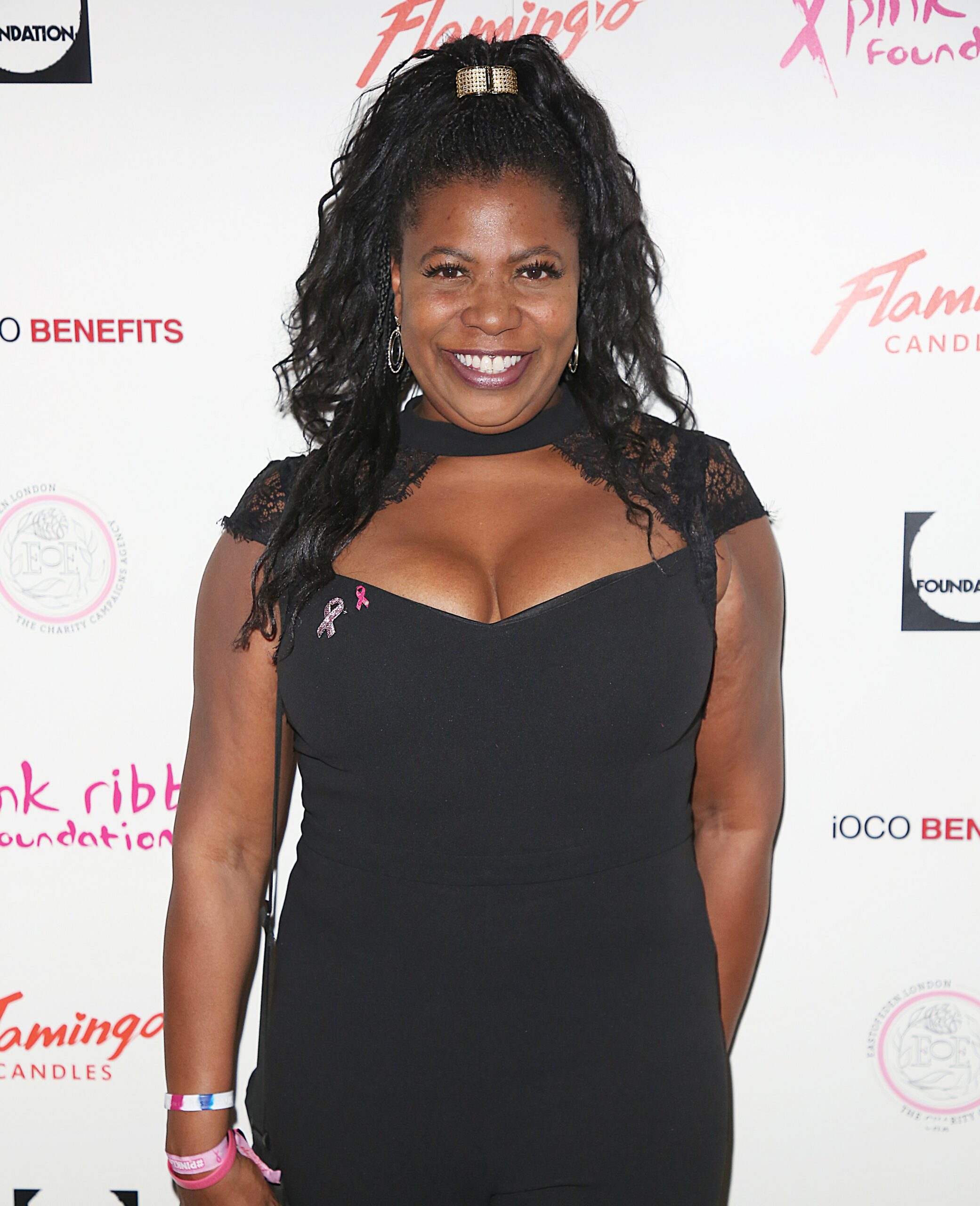 Brenda Edwards smiles at camera at event