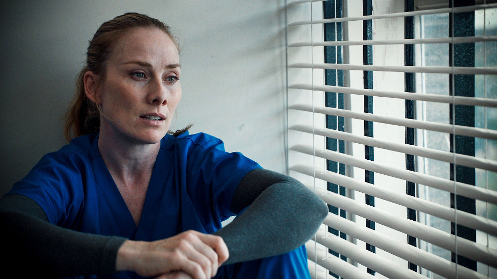 Jac from holby city in scrubs 