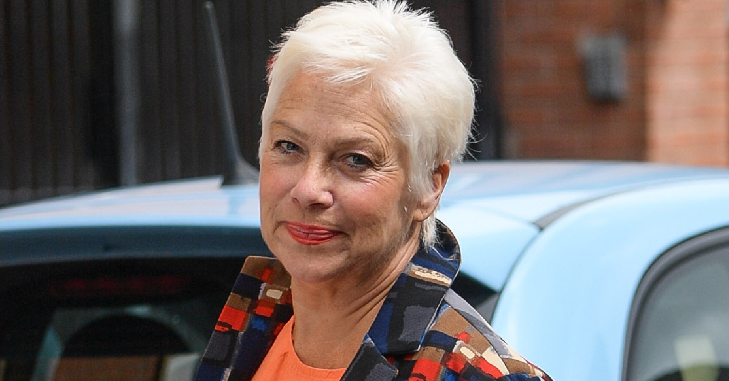 Denise Welch looks at camera during outing