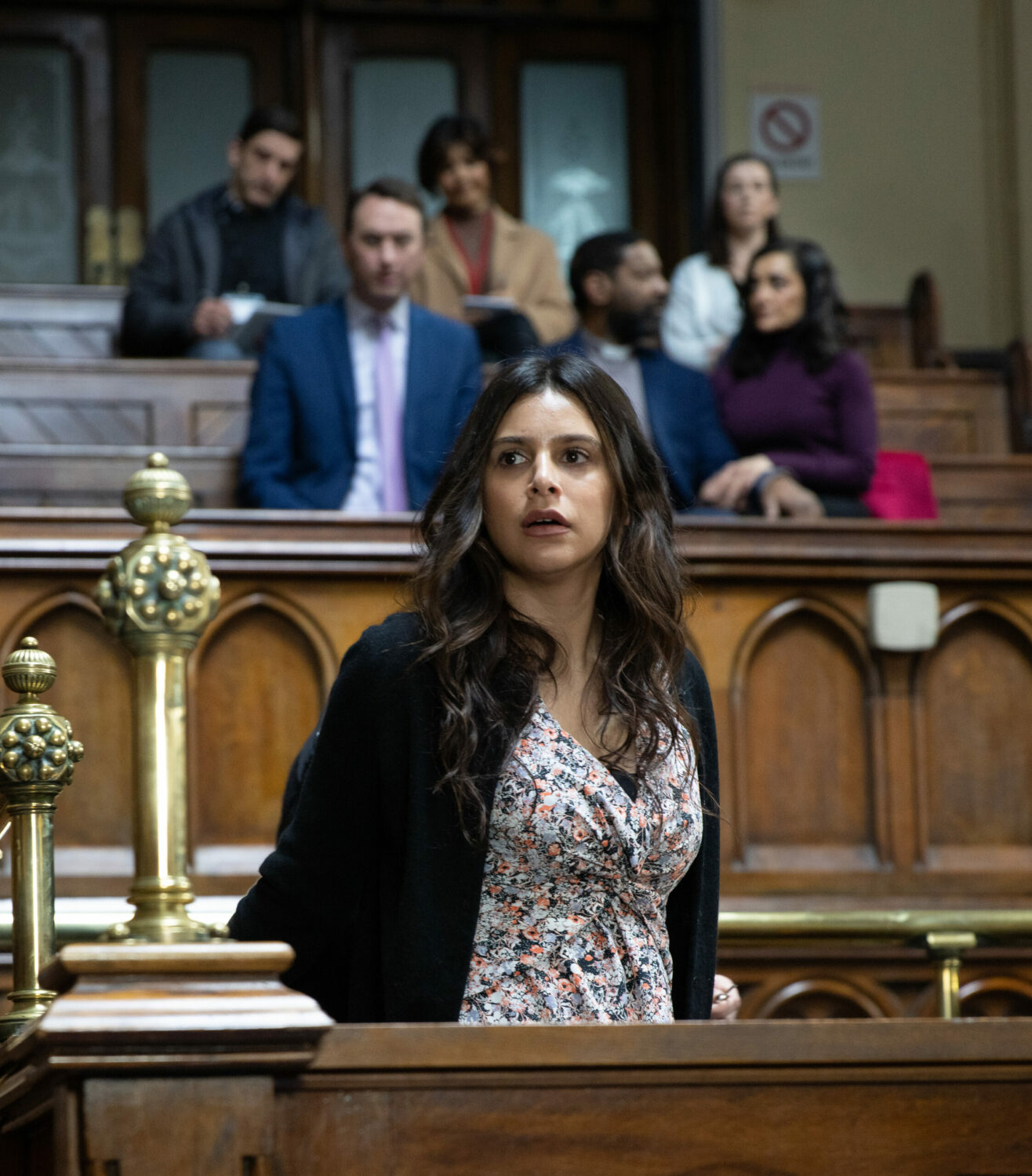 Meena looks surprised as she awaits her verdict in Emmerdale