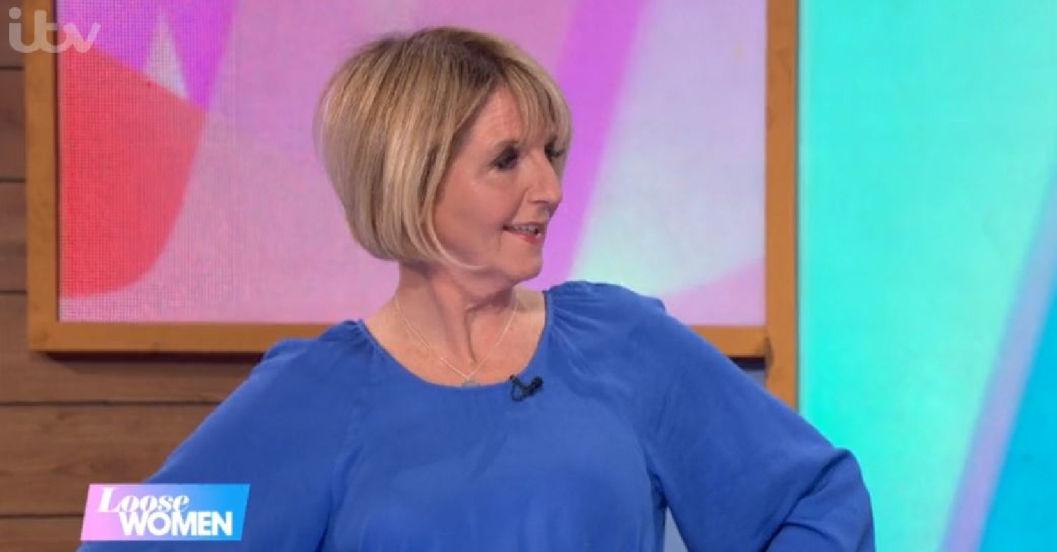 Kaye Adams wearing a blue top smiling on Loose Women
