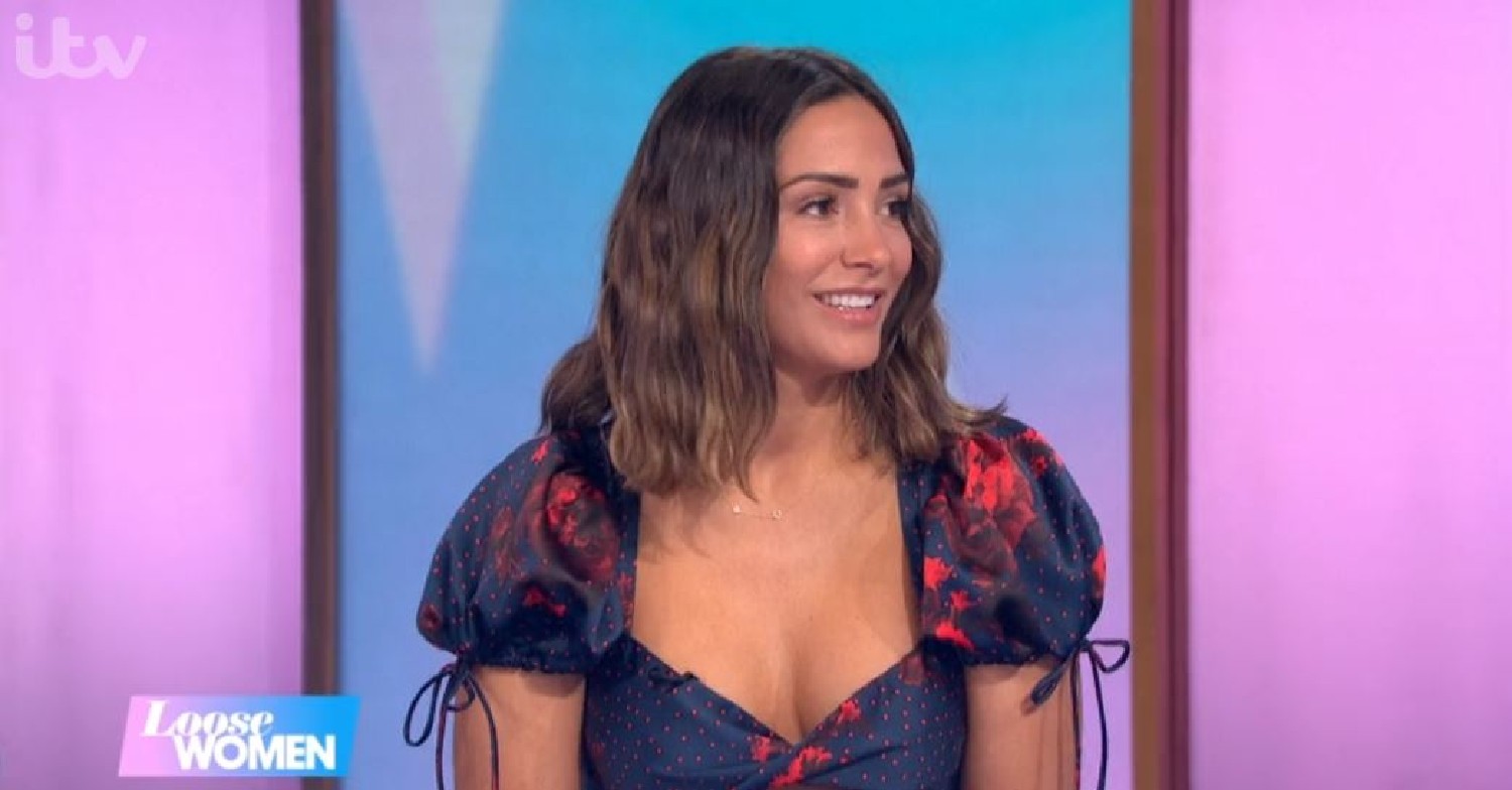 Frankie Bridge smiling in a lovely dress on Loose Women