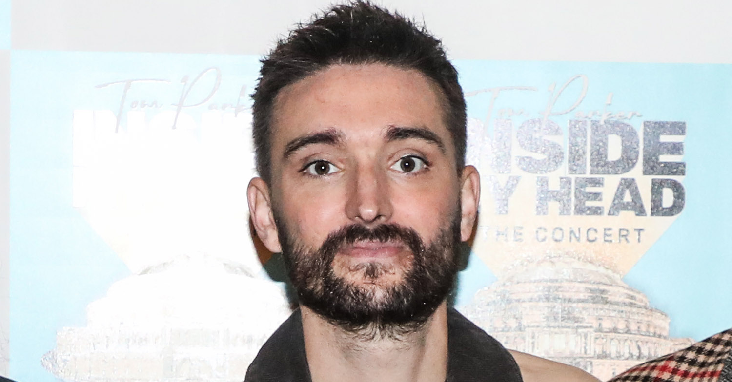 The Wanted's Tom Parker on the red carpet looking straight at the camera