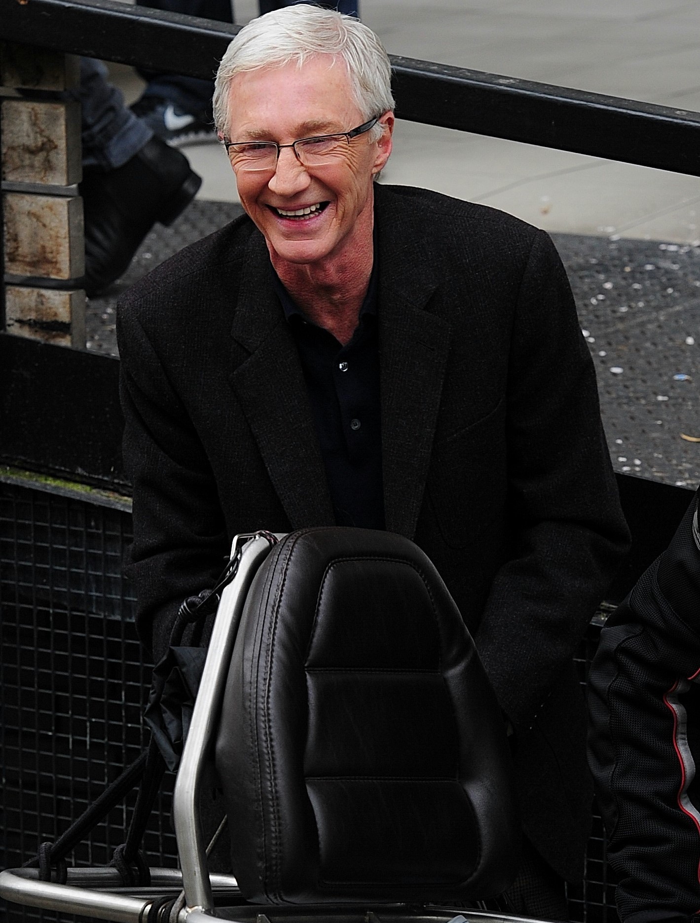 Paul O'Grady smiles outside the ITV Studios