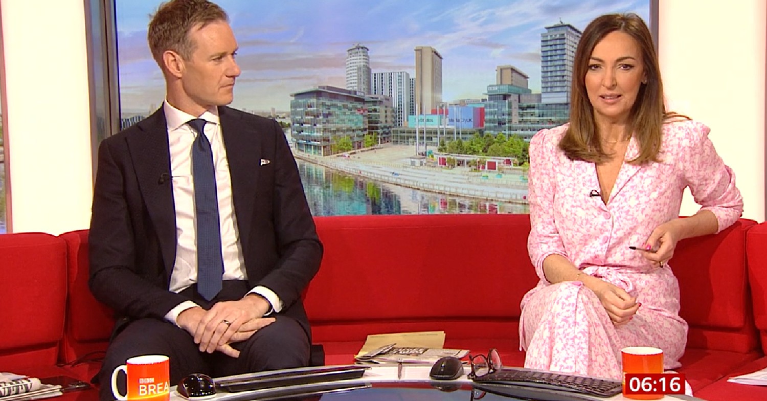 Dan Walker looks at Sally Nugent, in pink dress, on BBC Breakfast today