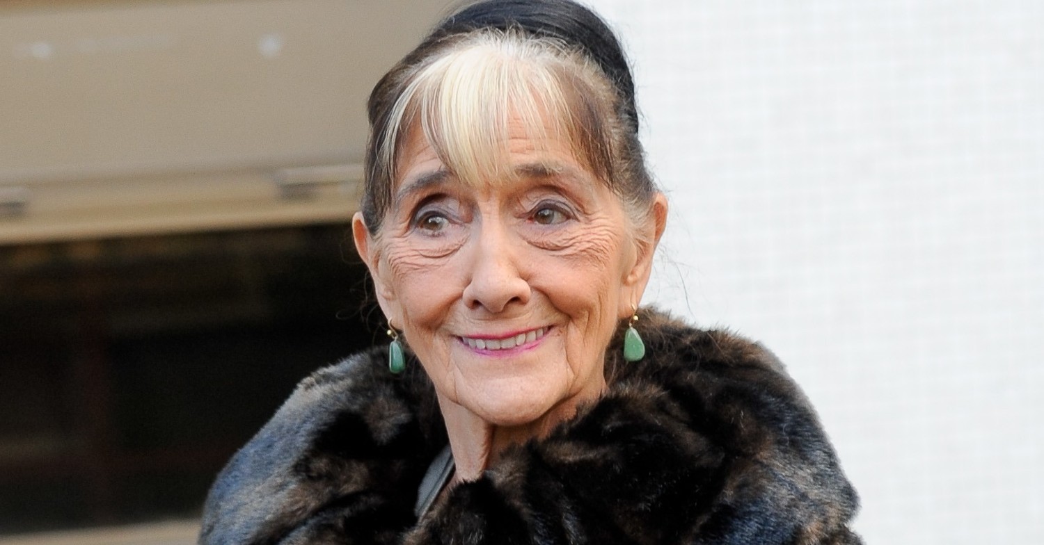 EastEnders star June Brown smiles to cameras in fur jacket