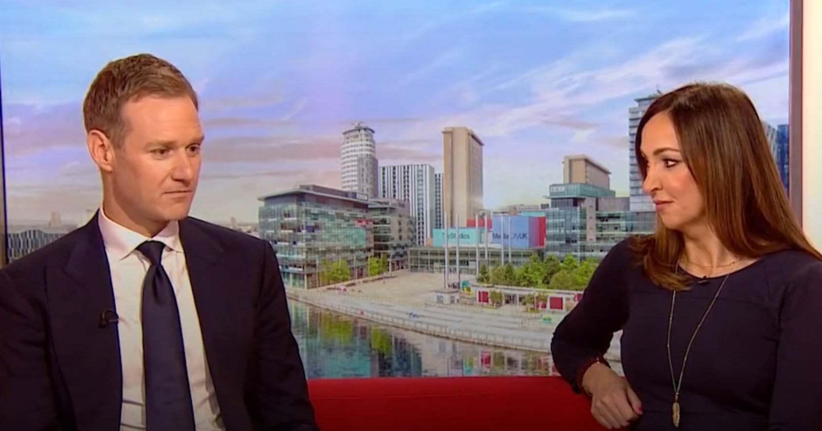 Dan Walker looking sad chatting with a sad looking Sally Nugent