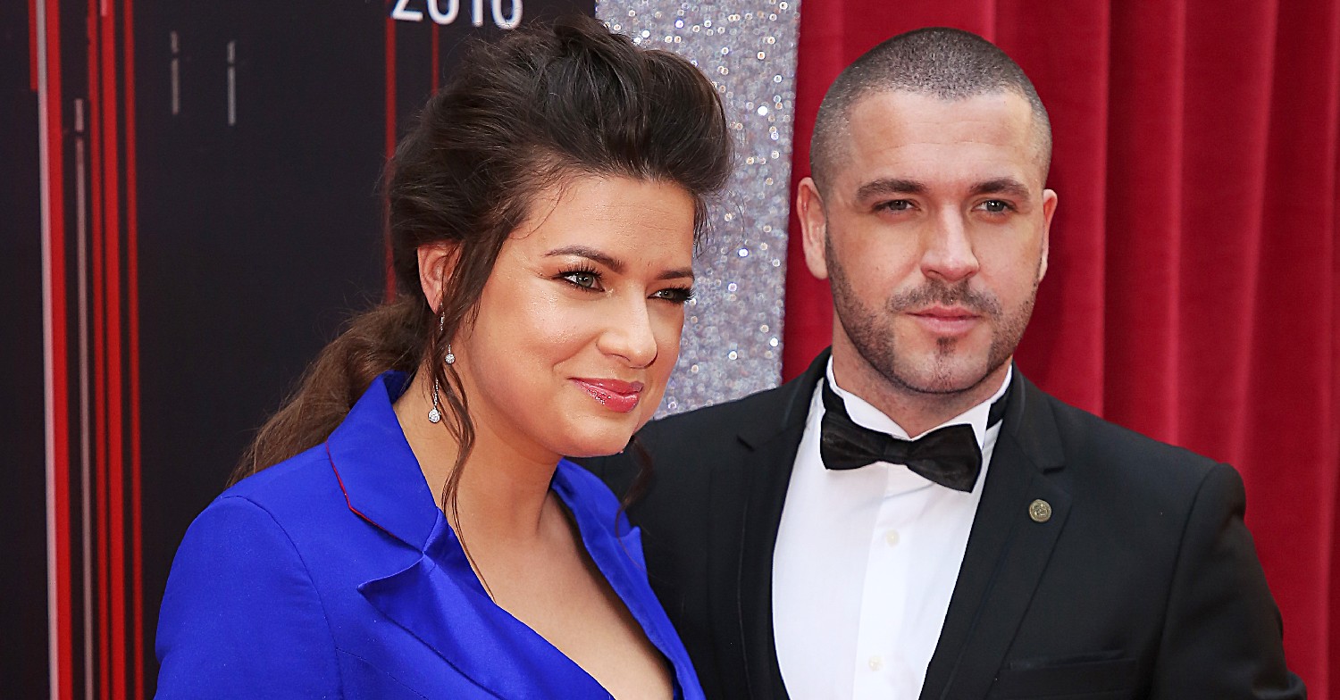 Shayne Ward and Sophie Austin smiling together on the red carpet
