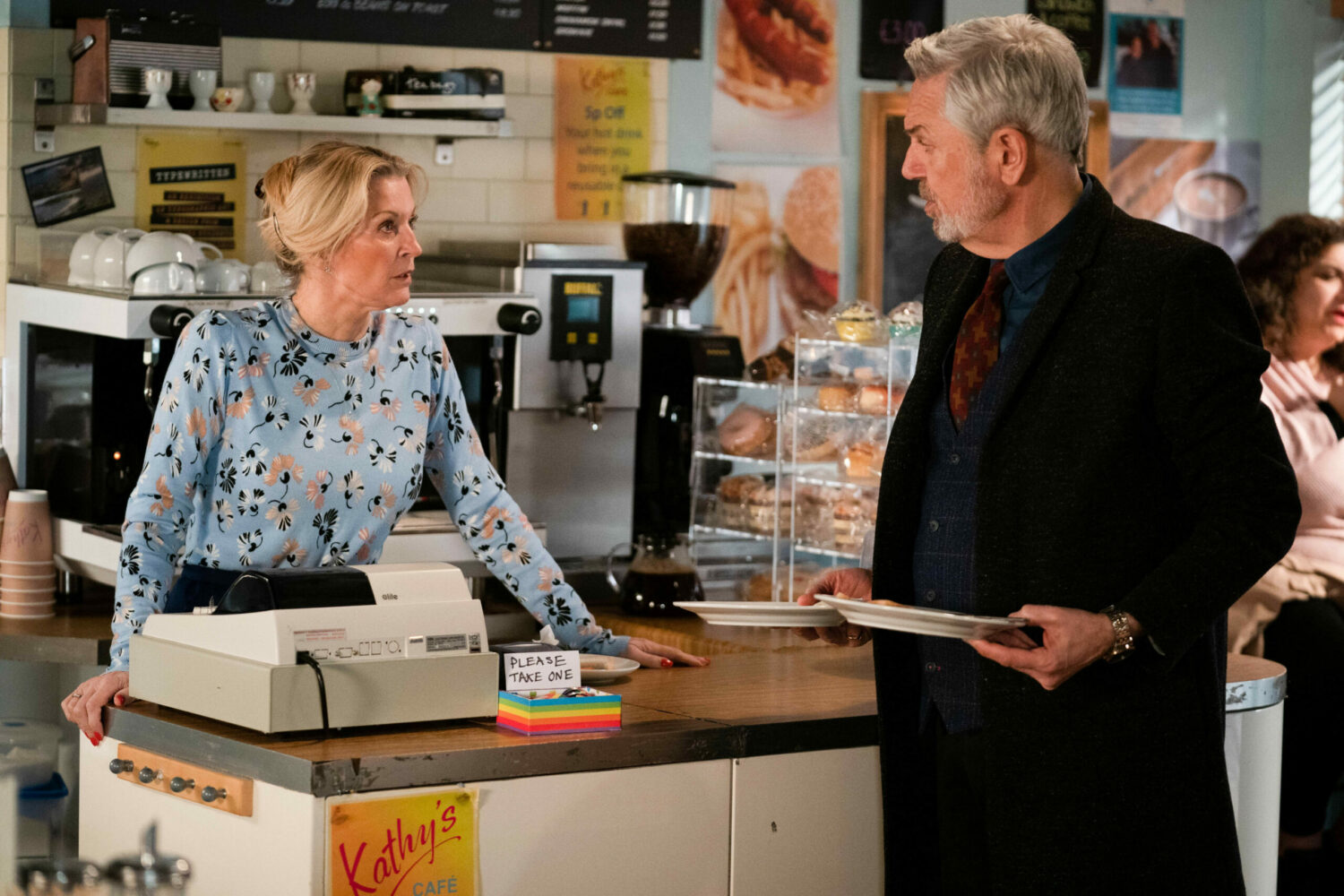 Kathy Beale is pleased when Rocky helps at the cafe in EastEnders