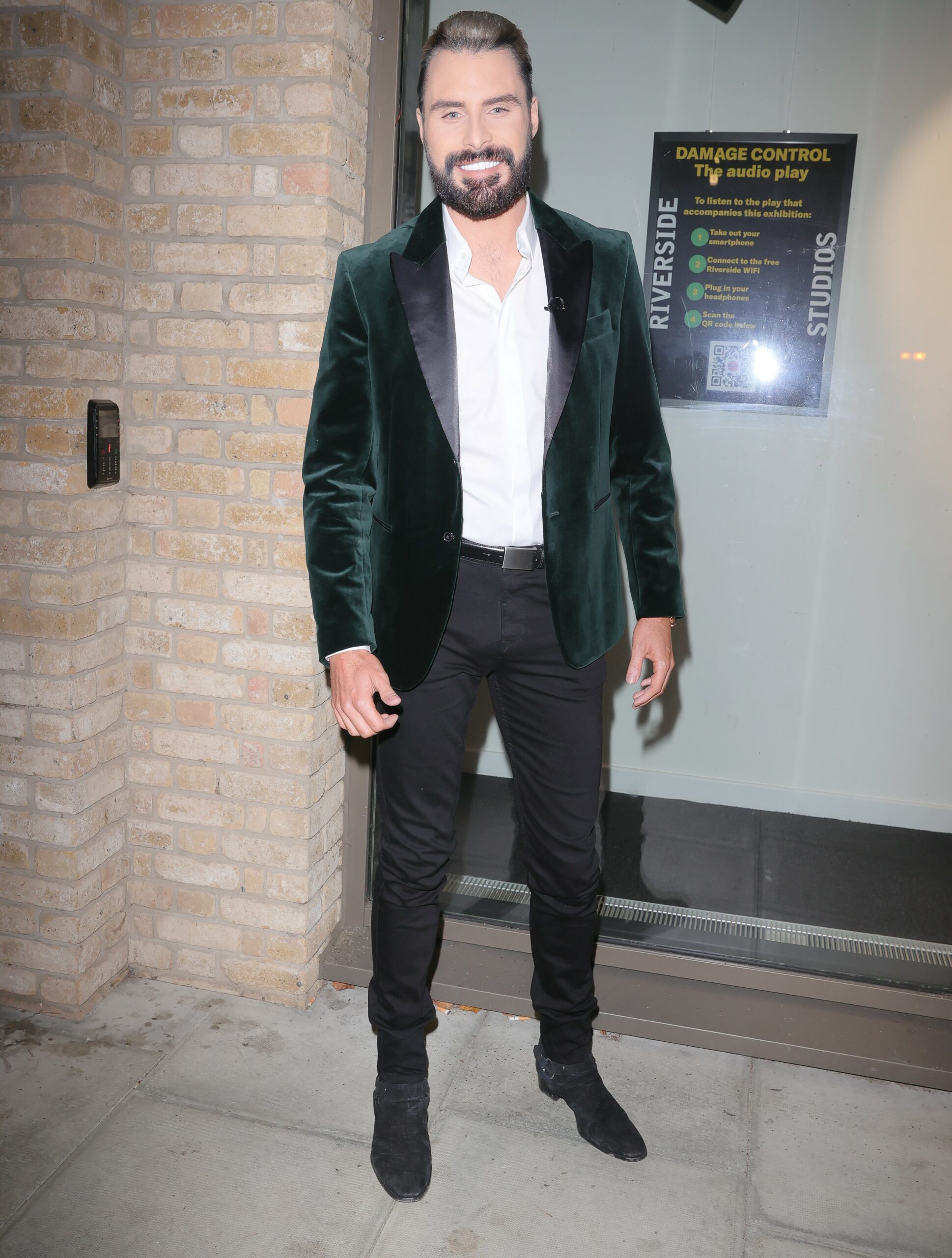 Rylan Clark smiles in velvet blazer
