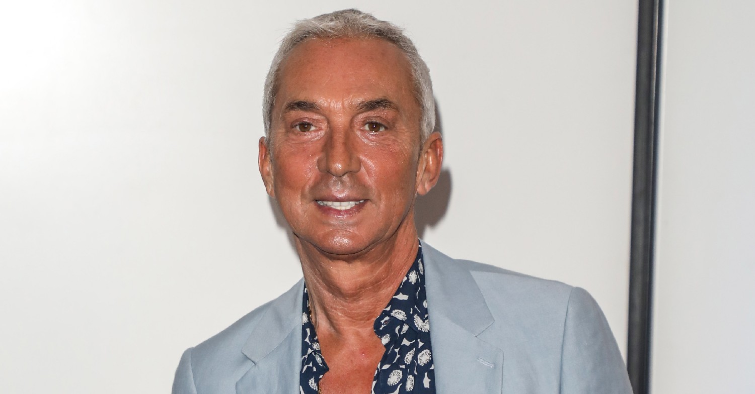 Strictly star Bruno Tonioli smiling in blue blazer and patterned shirt