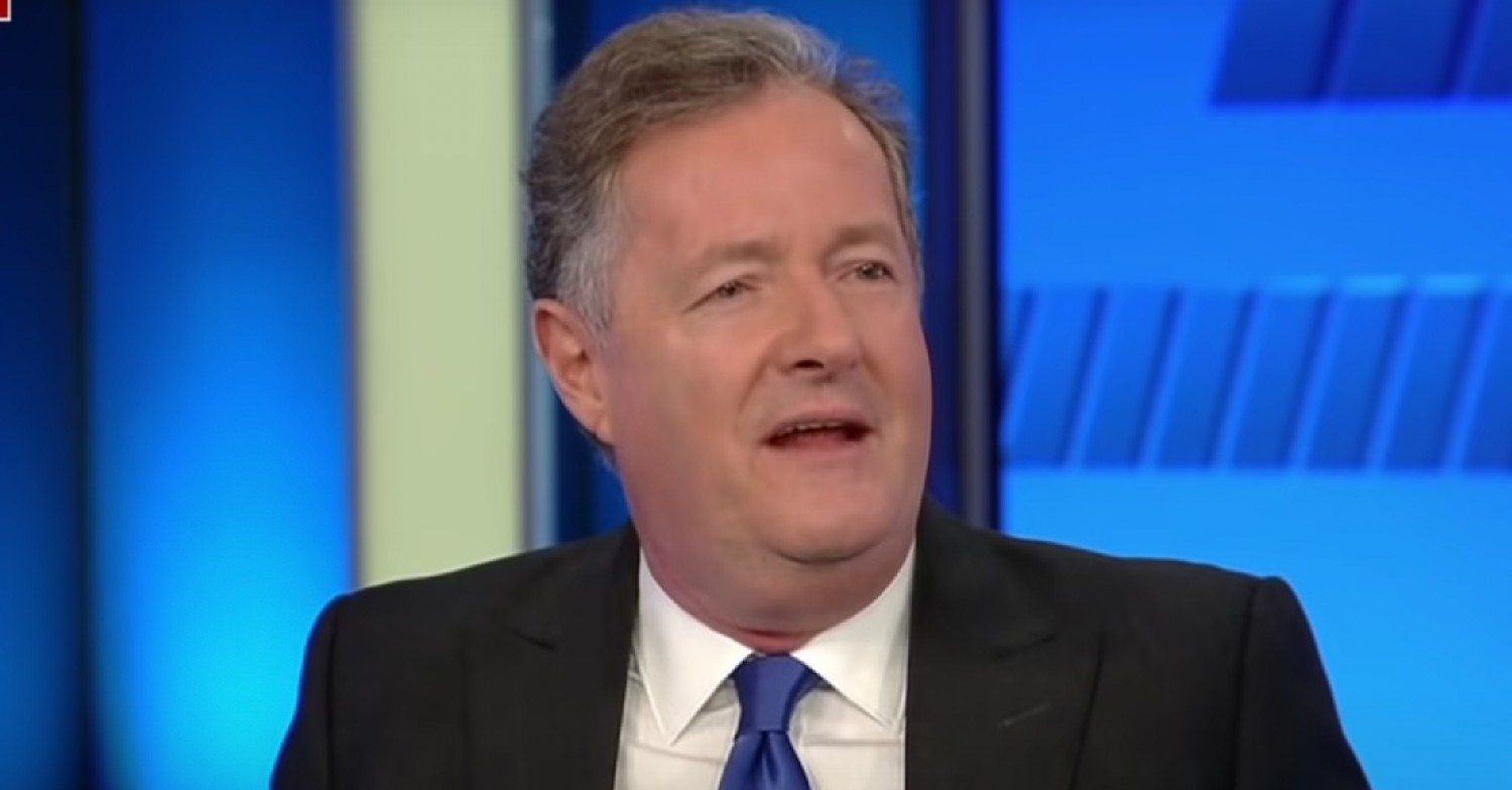 Piers Morgan in a suit, talking during interview on Fox News