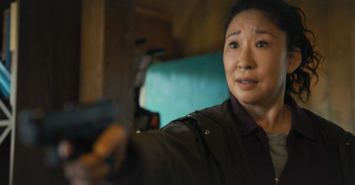 Eve holding a gun on Killing Eve