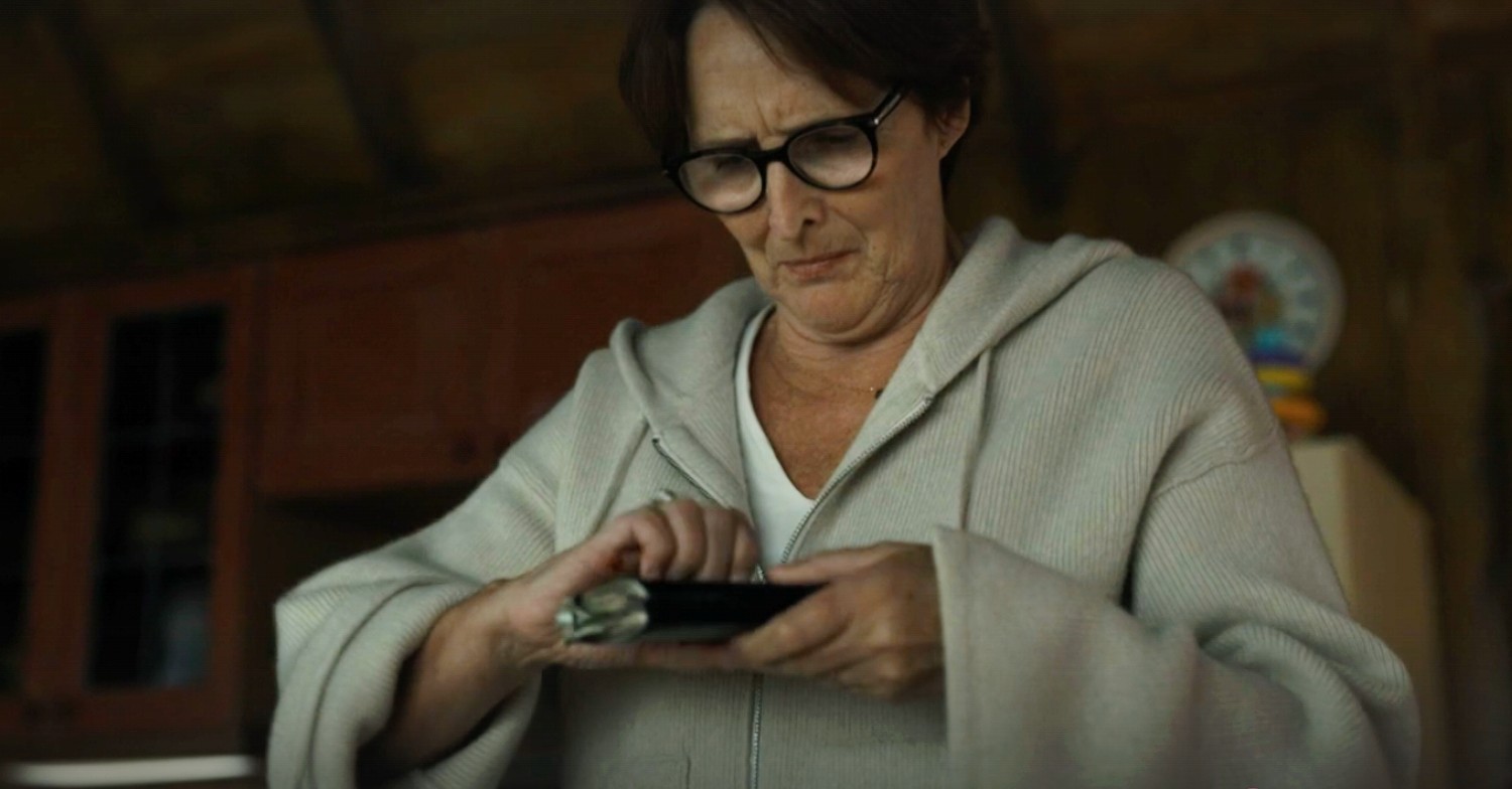 Carolyn holding a notebook on Killing Eve