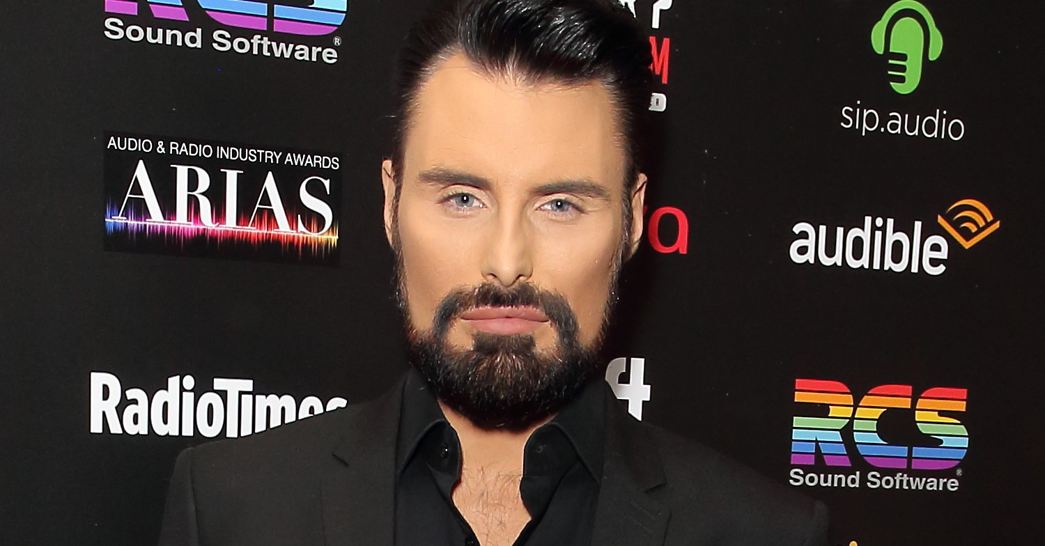 Rylan Clark poses in black blazer at Audio Radio & Industry Awards
