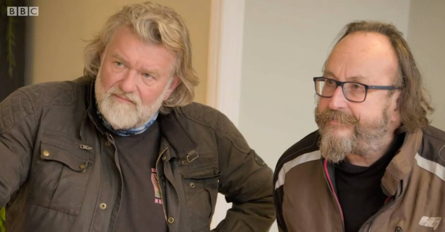 Dave Myers and Si King focusing intently on camera