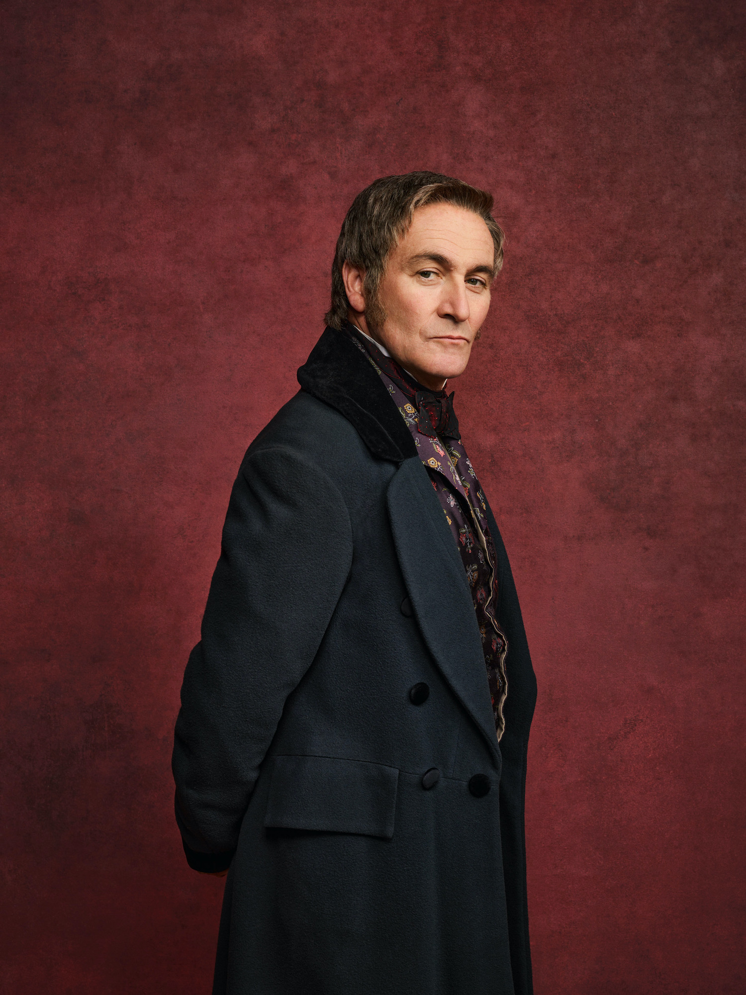 Derek Riddell side-eyeing the camera as Captain Sutherland in Gentleman Jack