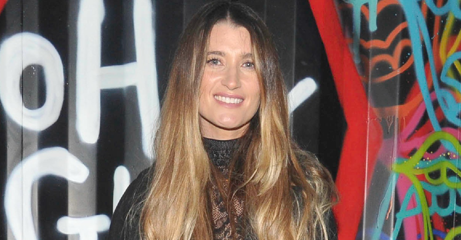 Charley Webb smiling for the camera