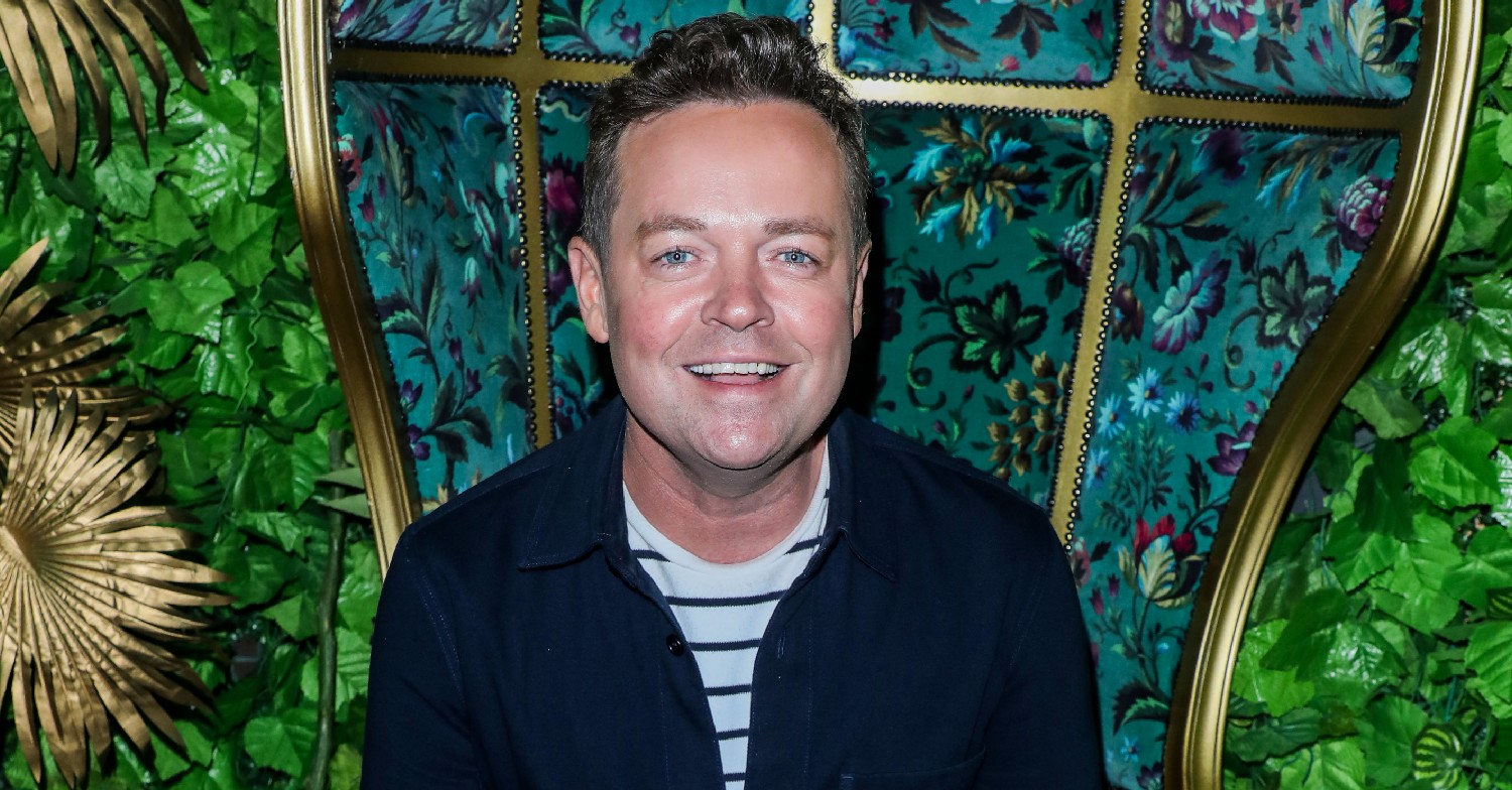 Stephen Mulhern smiles in striped top at event