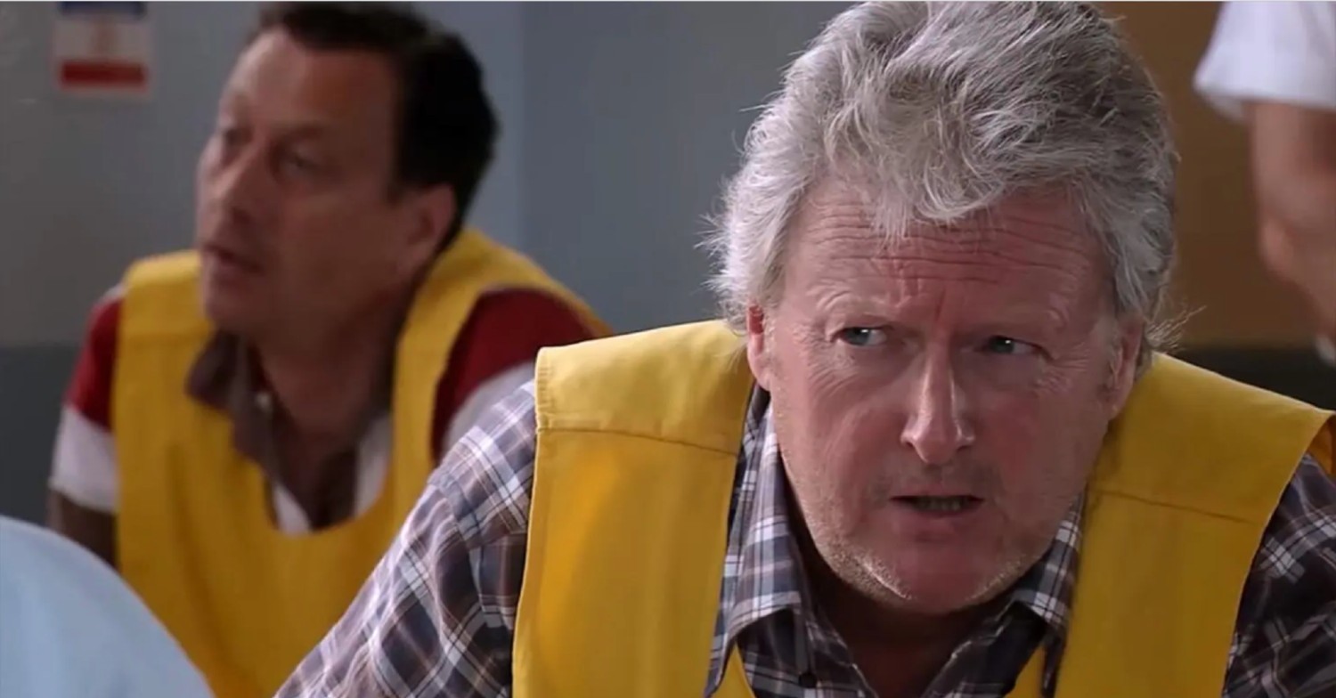 Jim McDonald from Corrie looking menacingly at his prison visitor