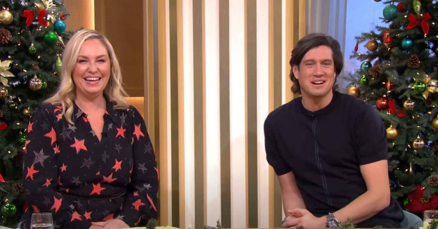 Josie Gibson and Vernon Kay smiling as they host This Morning