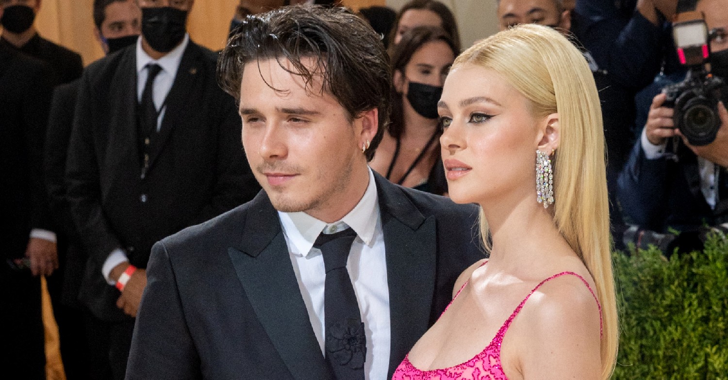 Brooklyn Beckham and Nicola Peltz pose at cameras at Met Gala