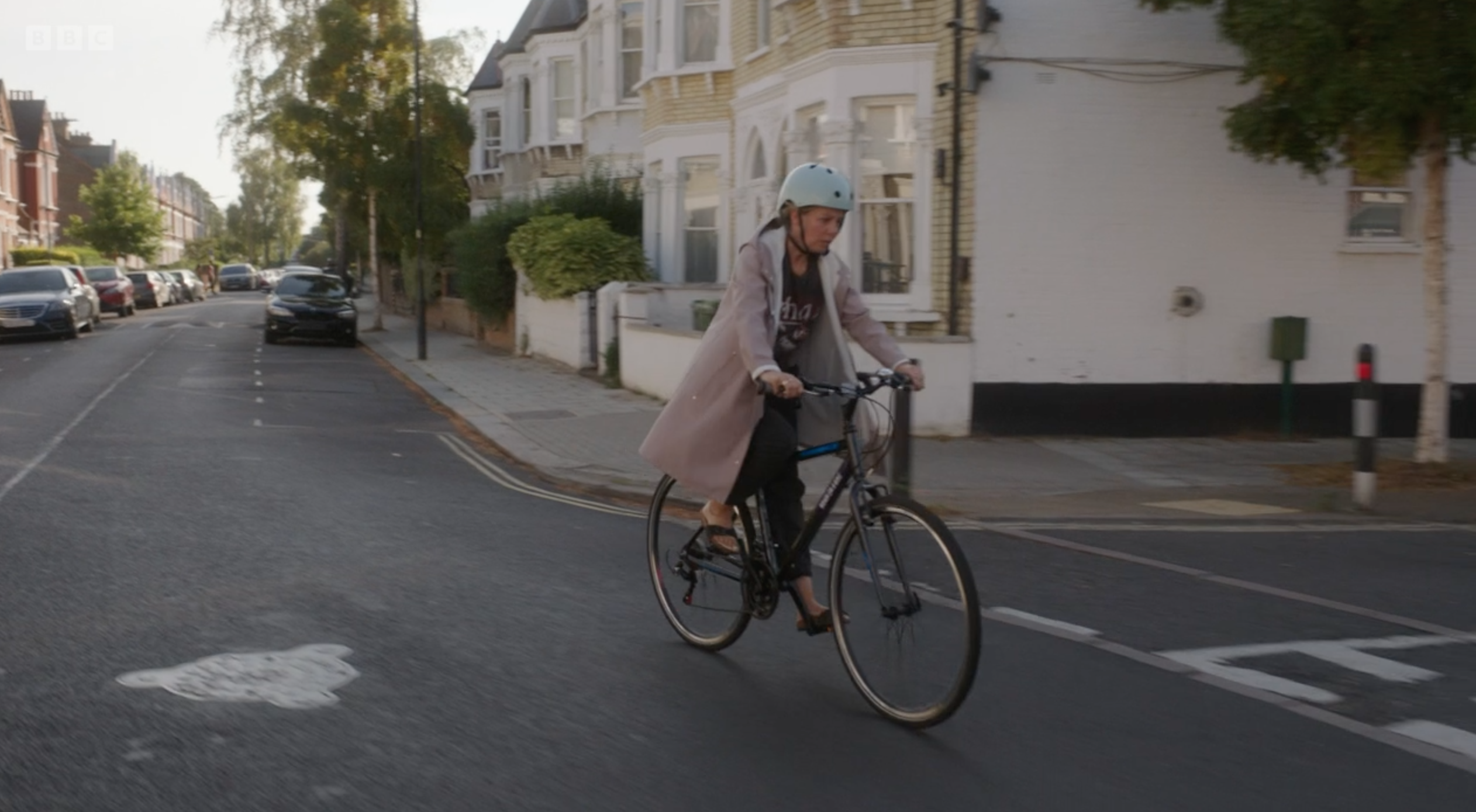 Rose riding James' bike on BBC drama The Split