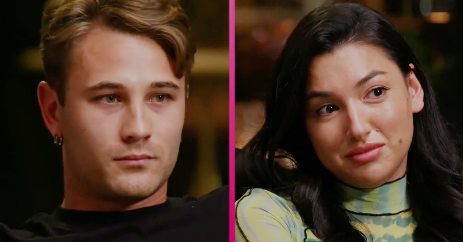 Ella smiling and Mitch frowning on Married At First Sight Australia