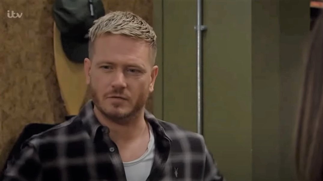 Emmerdale character David Metcalfe looks confused