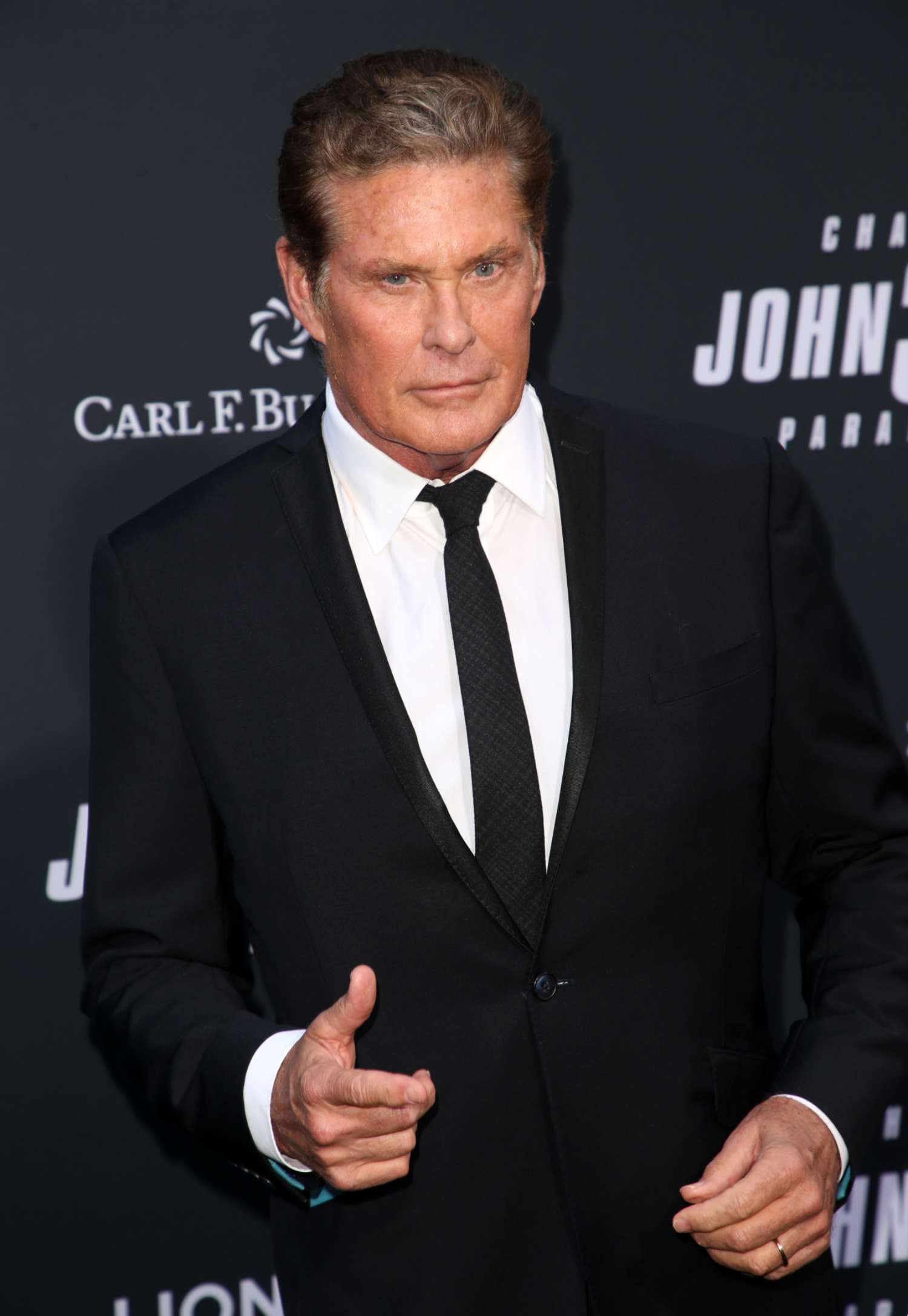 David Hasselhoff giving a thumbs up on the red carpet