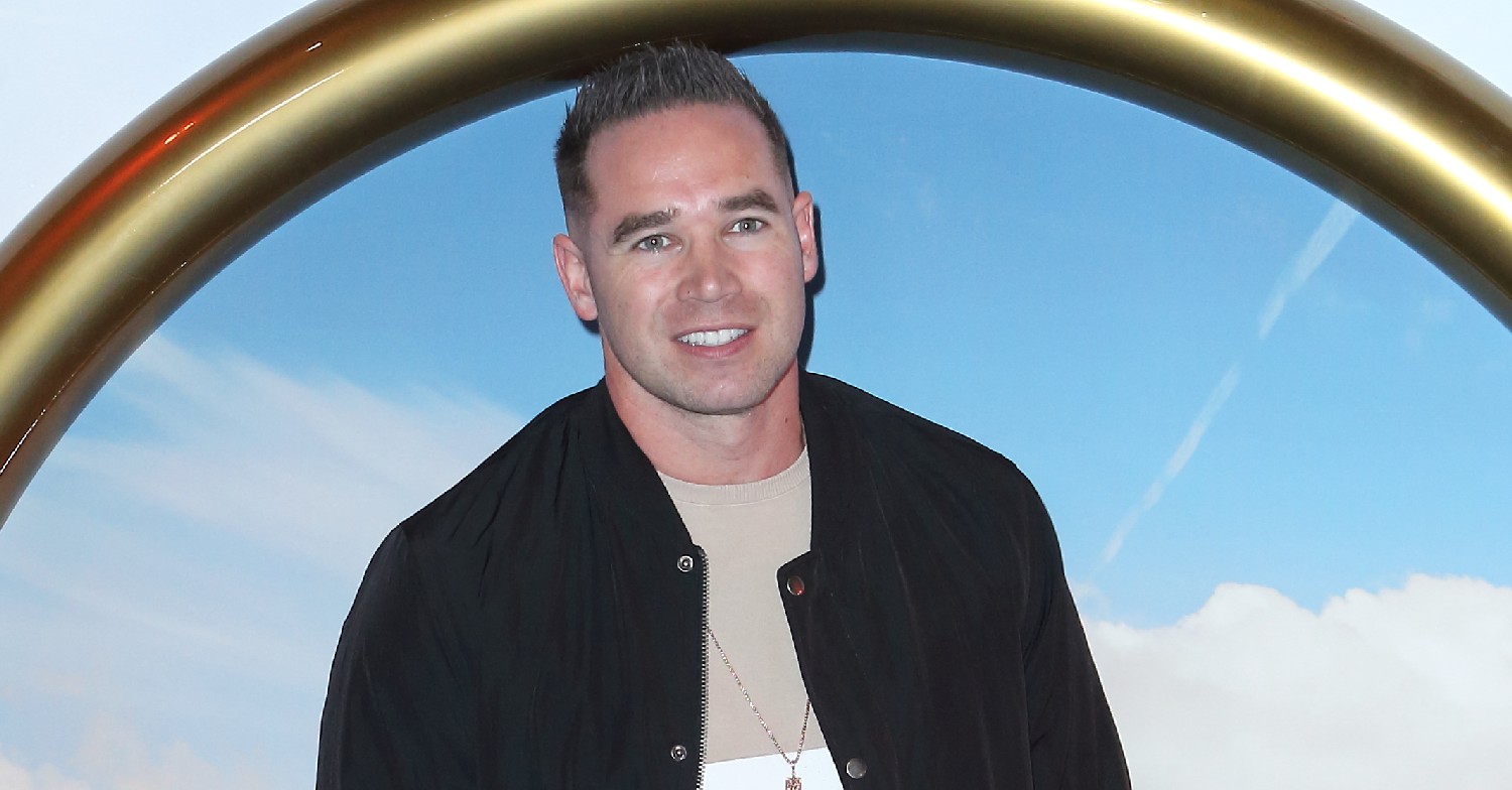 Kieran Hayler smiling on the red carpet