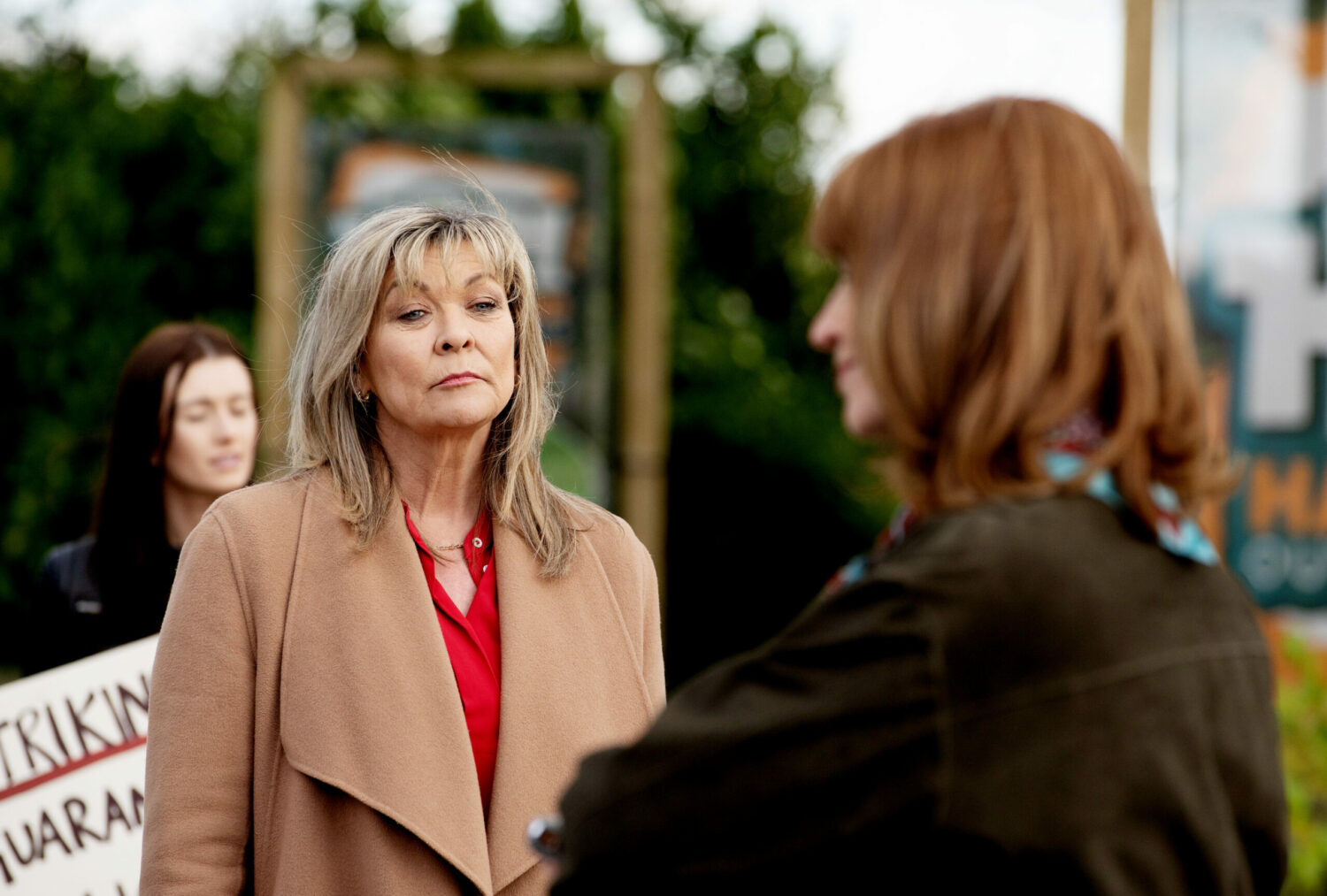 Emmerdale Kim looks annoyed with her friend outside picket line
