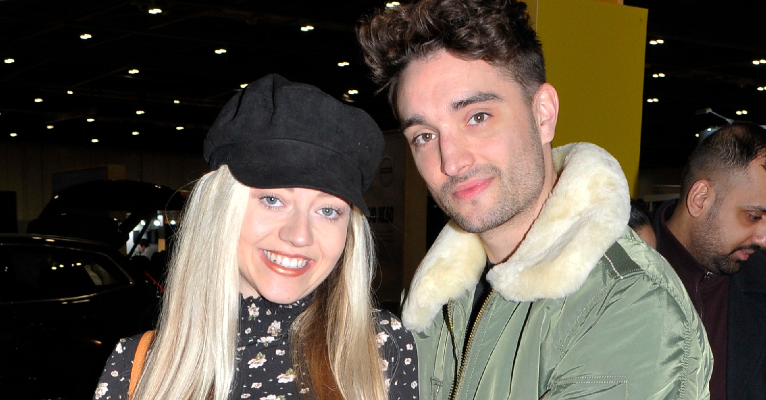 Tom Parker and Kelsey Parker looking happy