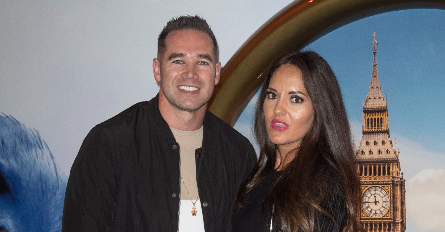 Kieran Hayler and Michelle Penticost smiling at an event