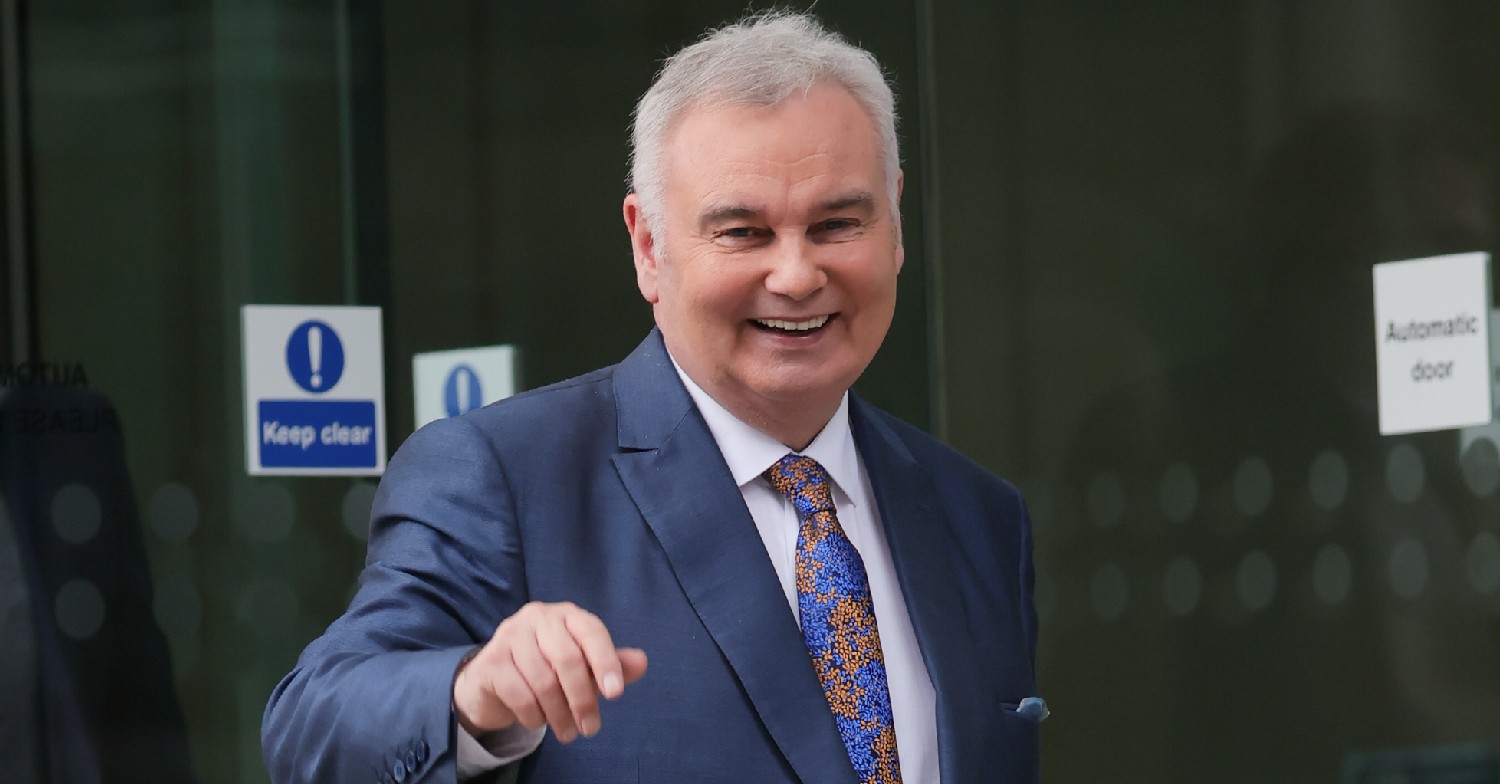 Eamonn Holmes smiling wearing a suit