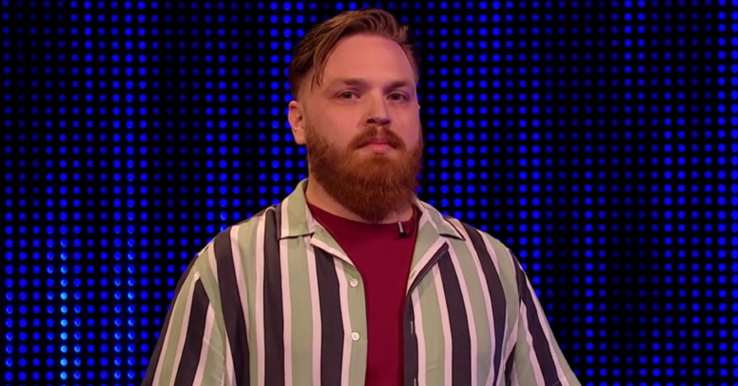 Contestant grimacing on The Chase