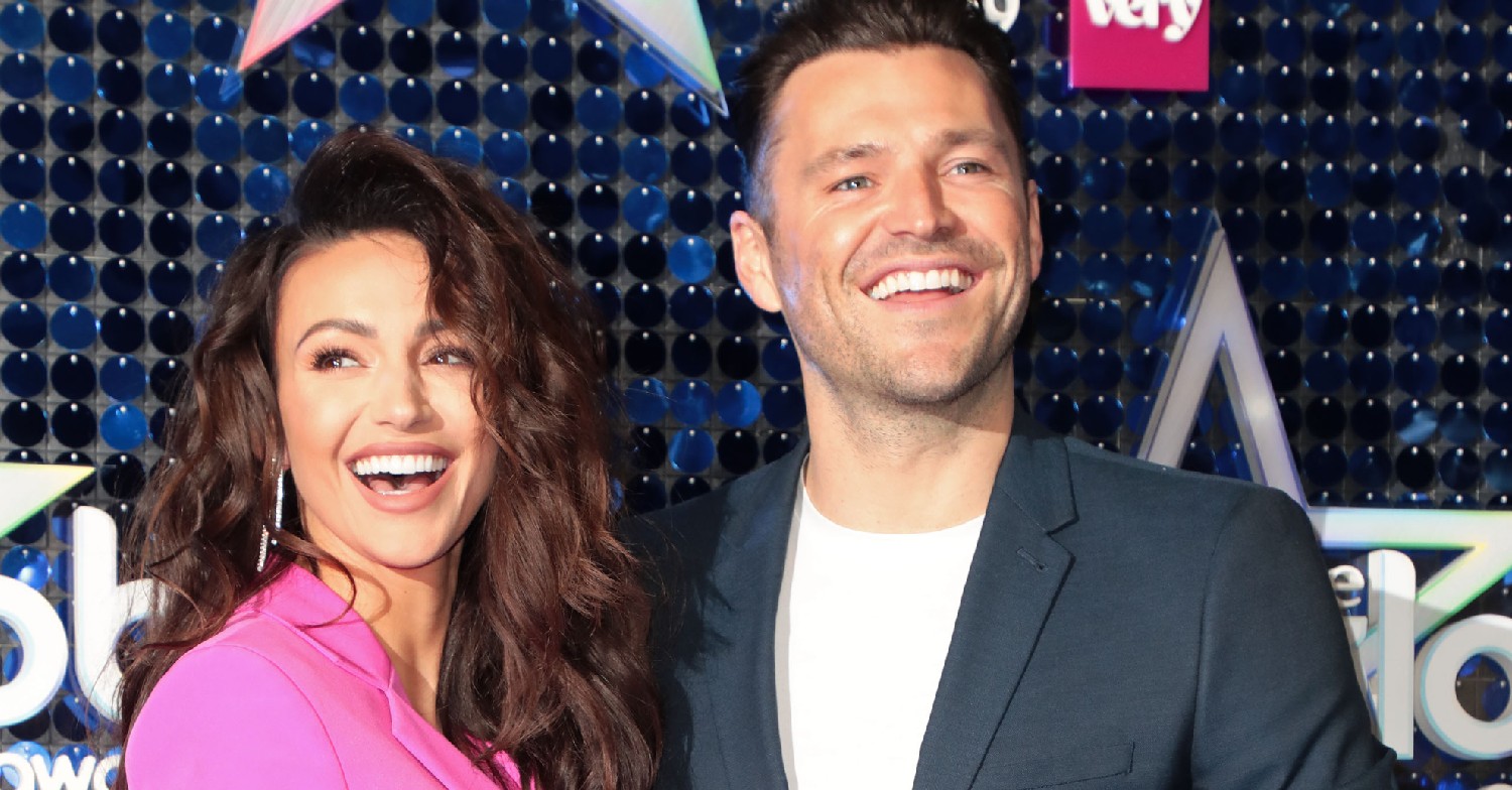 Mark Wright and Michelle Keegan smiling on the red carpet